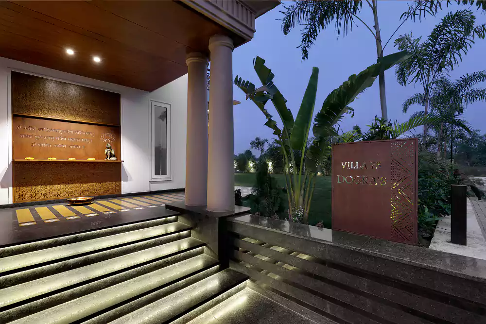 Italian marble flooring with Jaisalmer stone wall cladding and circular partition design.